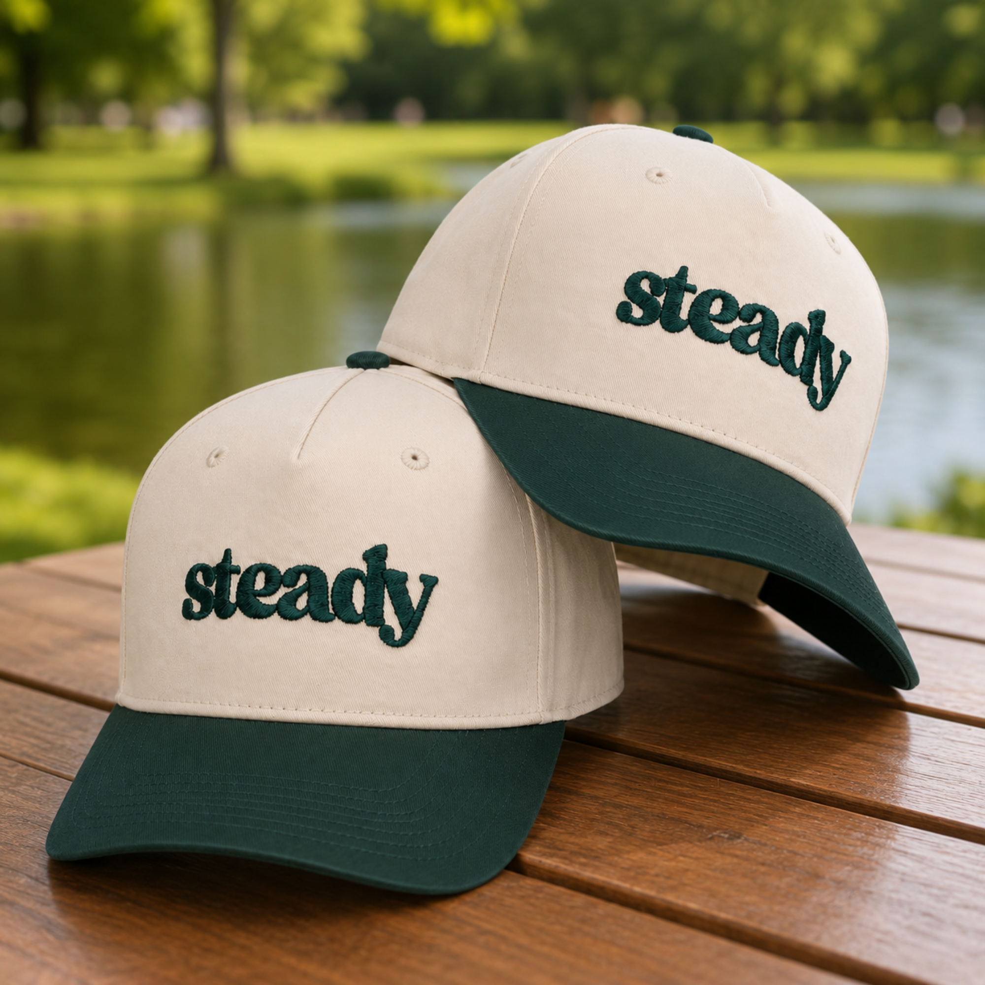 Two Steady Trucker Hats displayed outdoors.